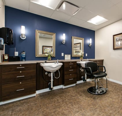 Interior view of a salon area with styling stations