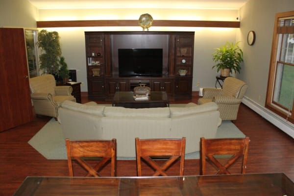 Interior common area with seating and television