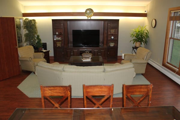 Interior common area with seating and television