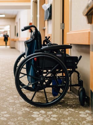 Wheelchair positioned in a hallway