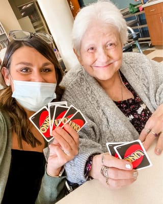 Residents enjoying a game of Uno together