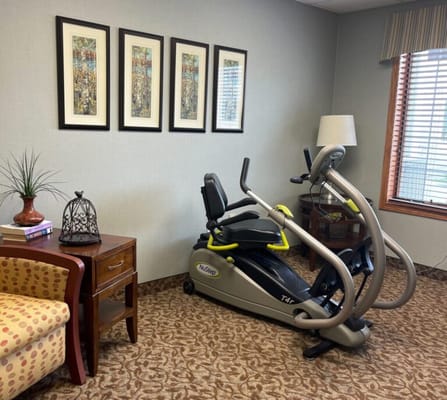 Fitness equipment in a cozy common area