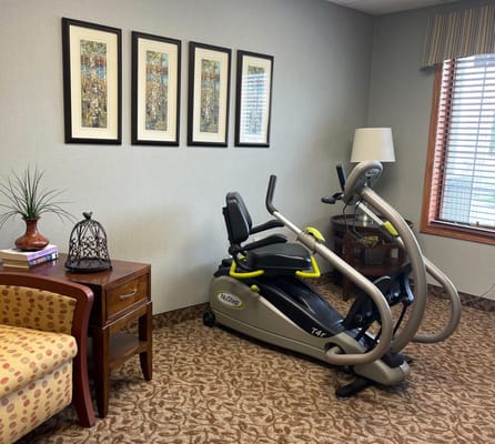 Fitness equipment in a cozy common area