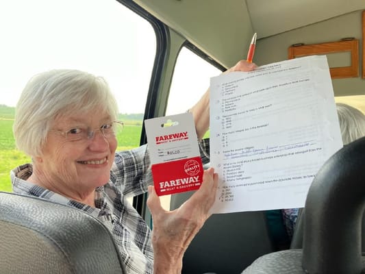 Resident enjoying an outing with a shopping bag