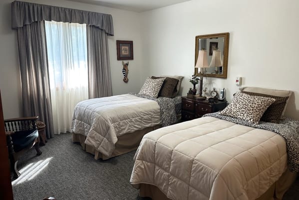Bright and cozy resident room with twin beds