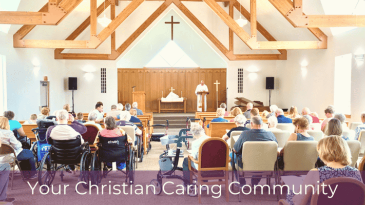 Residents and staff gathered in a chapel service