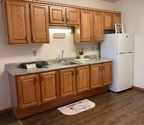 Interior kitchen space with wooden cabinets