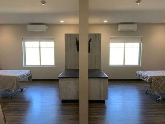 Interior view of a shared resident room with beds