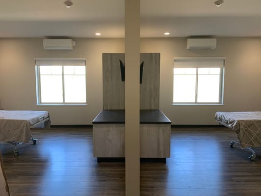 Interior view of a shared resident room with beds