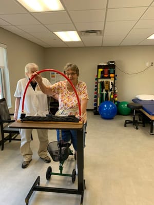 Residents participating in a physical therapy activity