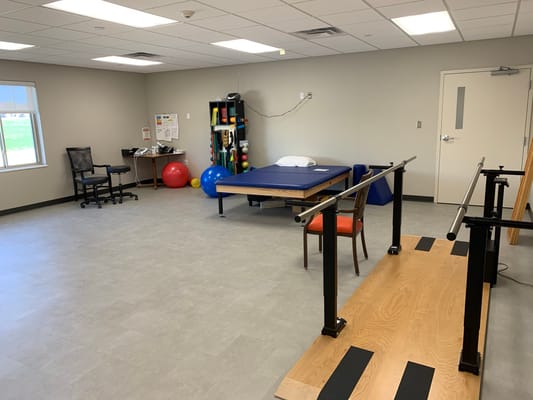 Therapy room with equipment and exercise space