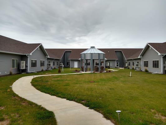 Pathway leading through landscaped outdoor space