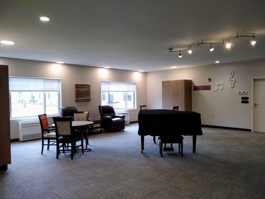 Interior view of a bright common area with seating