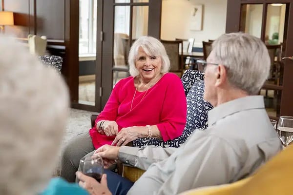 Residents enjoying conversation in a common area