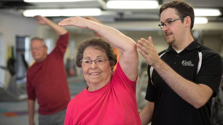 Senior resident participating in a physical therapy session