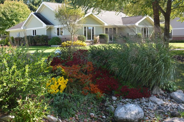 Beautiful flower garden in front of a senior living facility