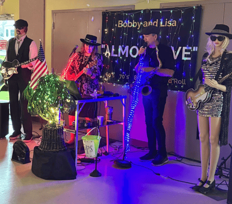 Musicians performing at a senior facility event