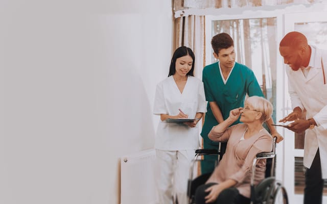 Staff interacting with a resident in a care facility