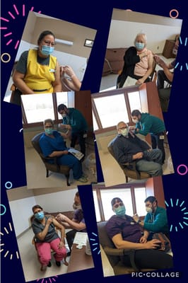 Residents receiving vaccinations in a cozy interior setting