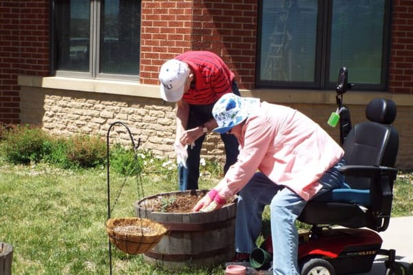 Residents gardening in an outdoor space
