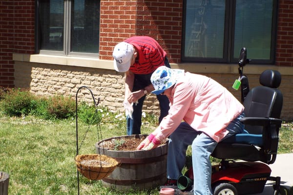 Residents gardening in an outdoor space