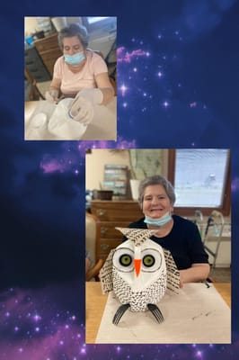 Residents engaging in a crafting activity indoors