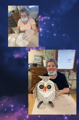 Residents engaging in a crafting activity indoors