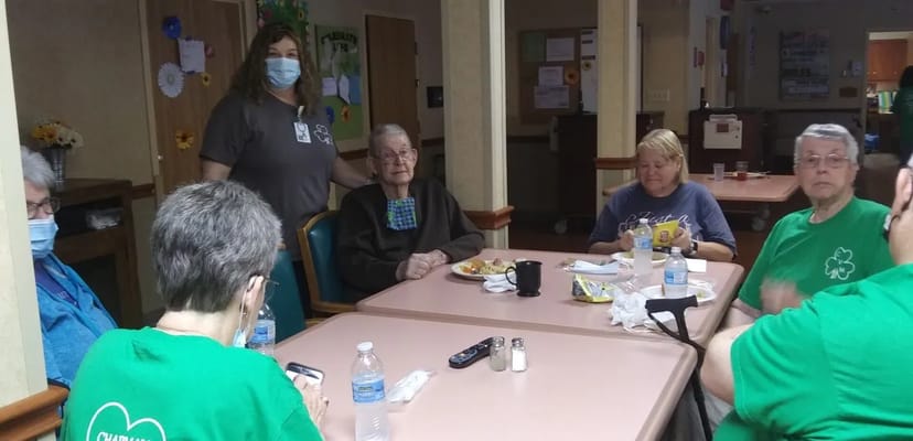 Residents enjoying a meal in the dining room