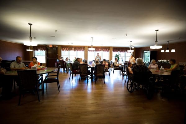 Residents enjoying time together in a communal activity space