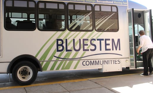 Facility transport vehicle with community branding