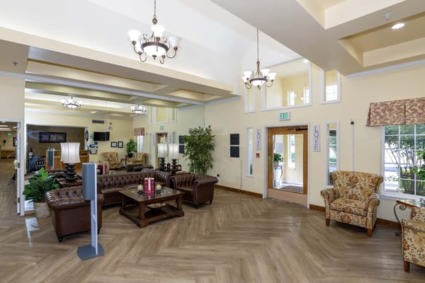 Spacious lobby area with seating and decorative elements
