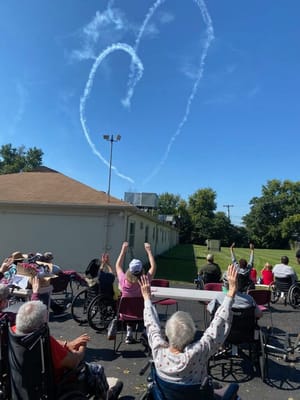Residents enjoying an outdoor activity with skywriting