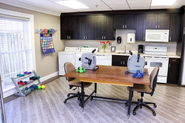 Fitness area with exercise equipment and weights