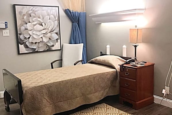 Bright private resident room with a floral decoration