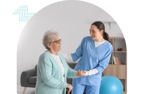 Caregiver assisting a senior resident in a cozy living area