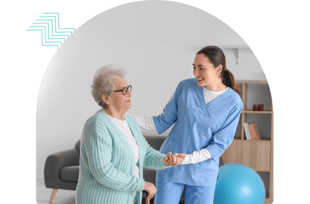 Caregiver assisting a senior resident in a cozy living area