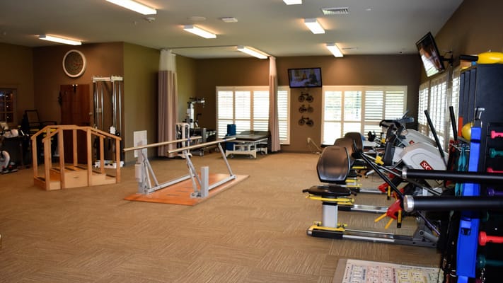 Inside view of a fitness area with exercise equipment