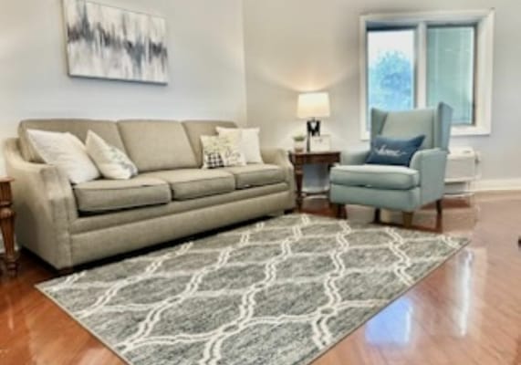 Cozy lounge area with seating and decor