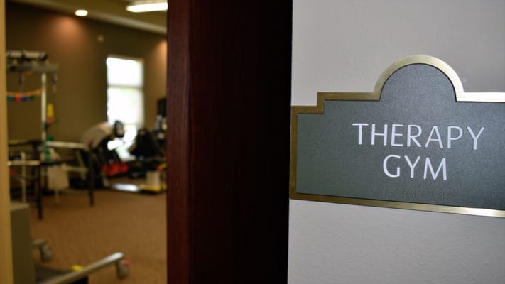 Sign for the therapy gym in an interior space