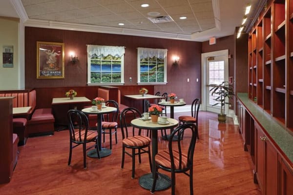 Cozy dining area with floral centerpieces