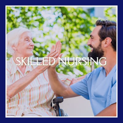 A caregiver and resident exchanging a high five outdoors