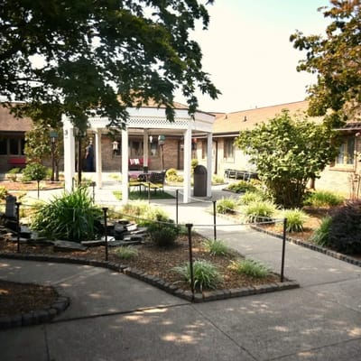 Outdoor space with seating areas and landscaping