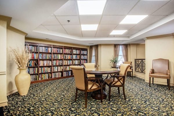 Interior common area with bookshelves and seating