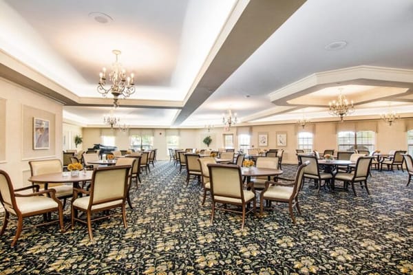 Bright dining room with tables and chairs