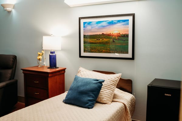 Cozy private resident room with a sunset picture