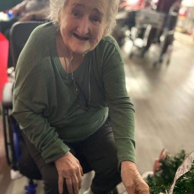 Resident participating in an activity in the common area