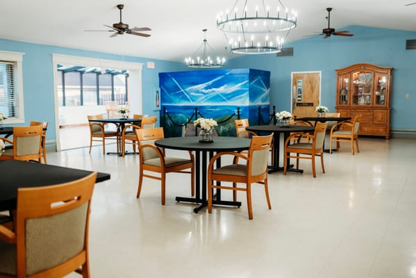 Bright dining room with tables and chairs