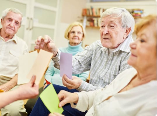 Residents engaged in an arts and crafts activity.