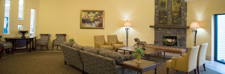 Cozy common area with seating and decorative art