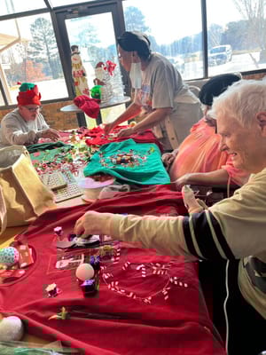 Residents participating in a festive craft activity